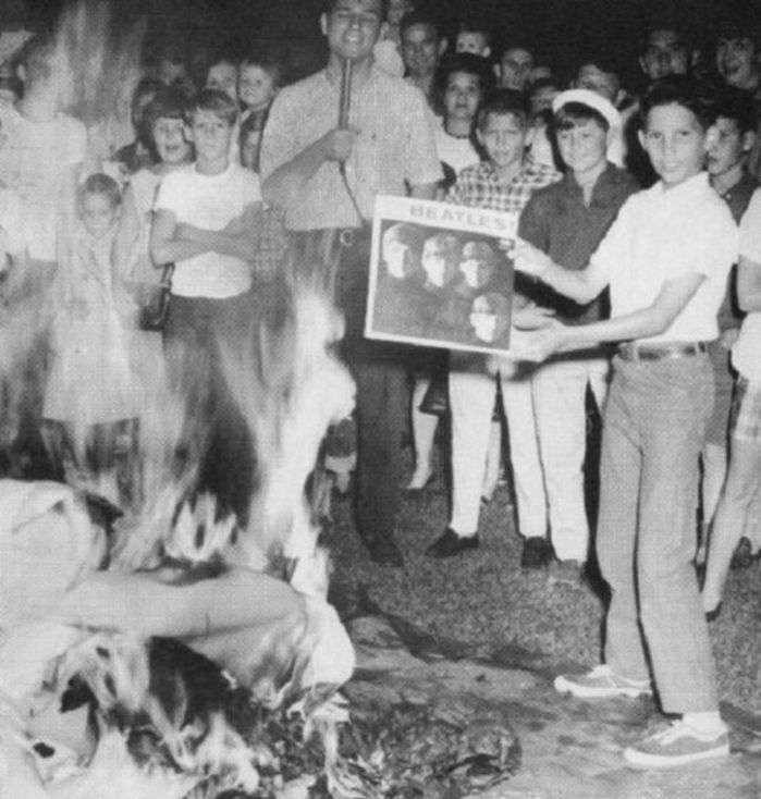 At a bonfire organised by a Birmingham radio station, Beatles records are burned
